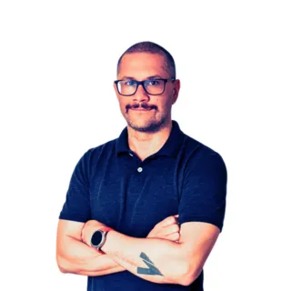Portrait of Kenny Dunn with arms crossed